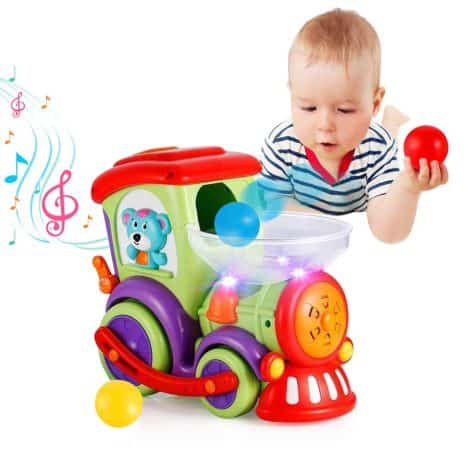 Jouet éducatif précoce pour bébés de 1 à 3 ans : Train électrique VATOS avec balles, lumière, musique et parlant.